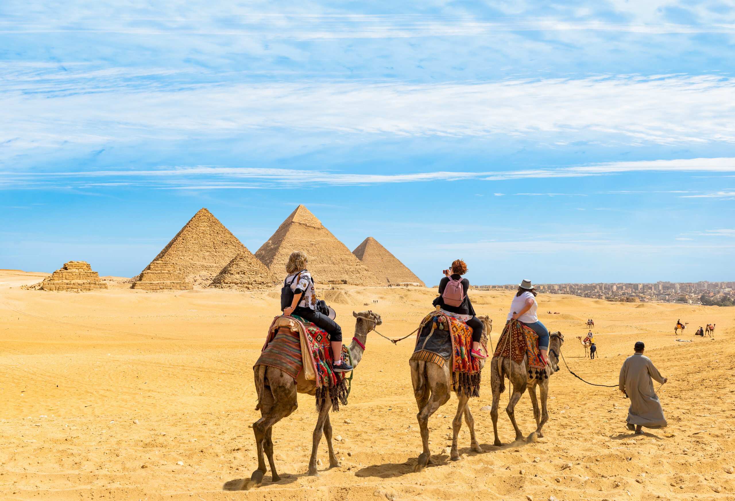 Camel riding near the Great Pyramids in Giza, Egypt