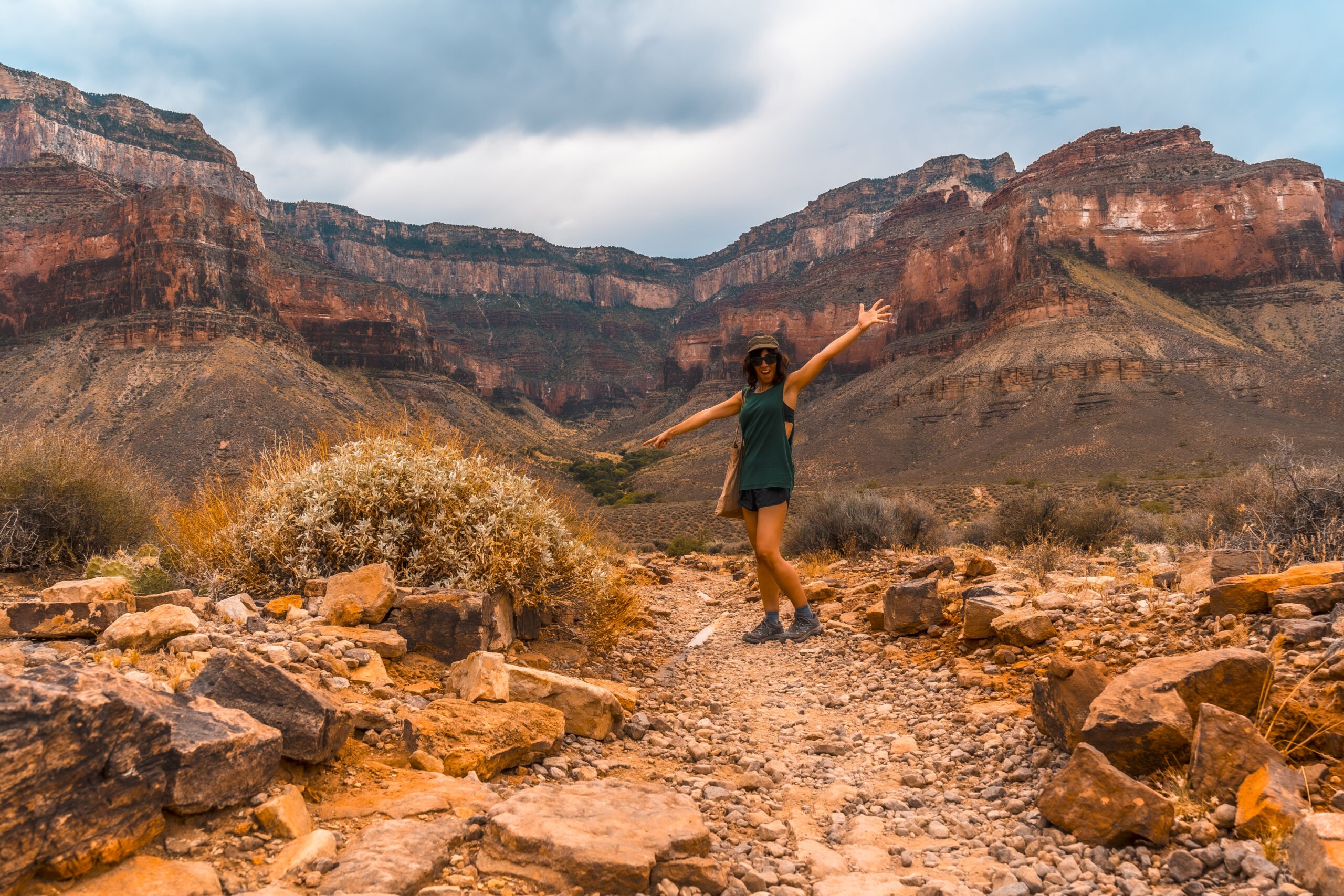 A young woman walking along the Bright Angel Trailhead at the Tonto West turnoff, in the Grand Canyon. Arizona